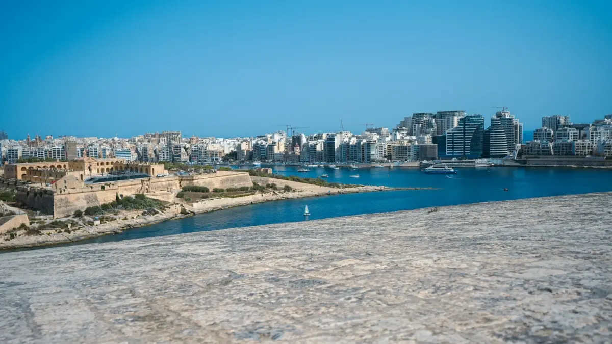 Stone fortification overlooking the harbour and skyline in Valletta, Malta, where Catena Media is headquartered