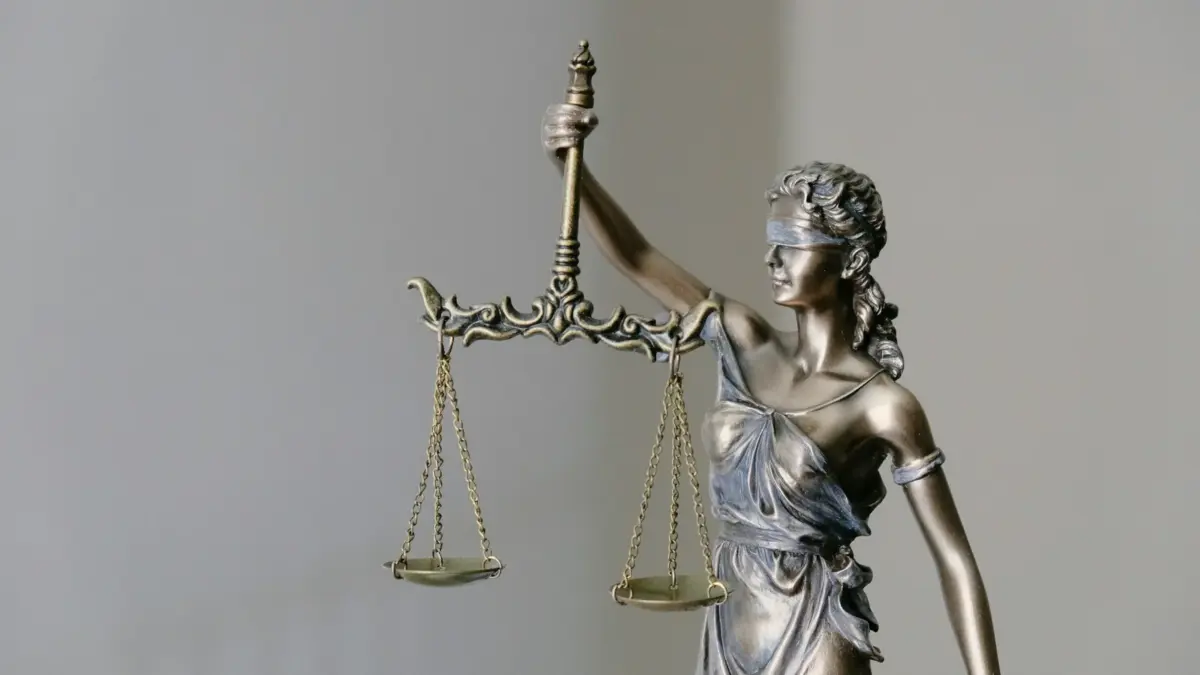 Lady Justice statue holding scales and a sword