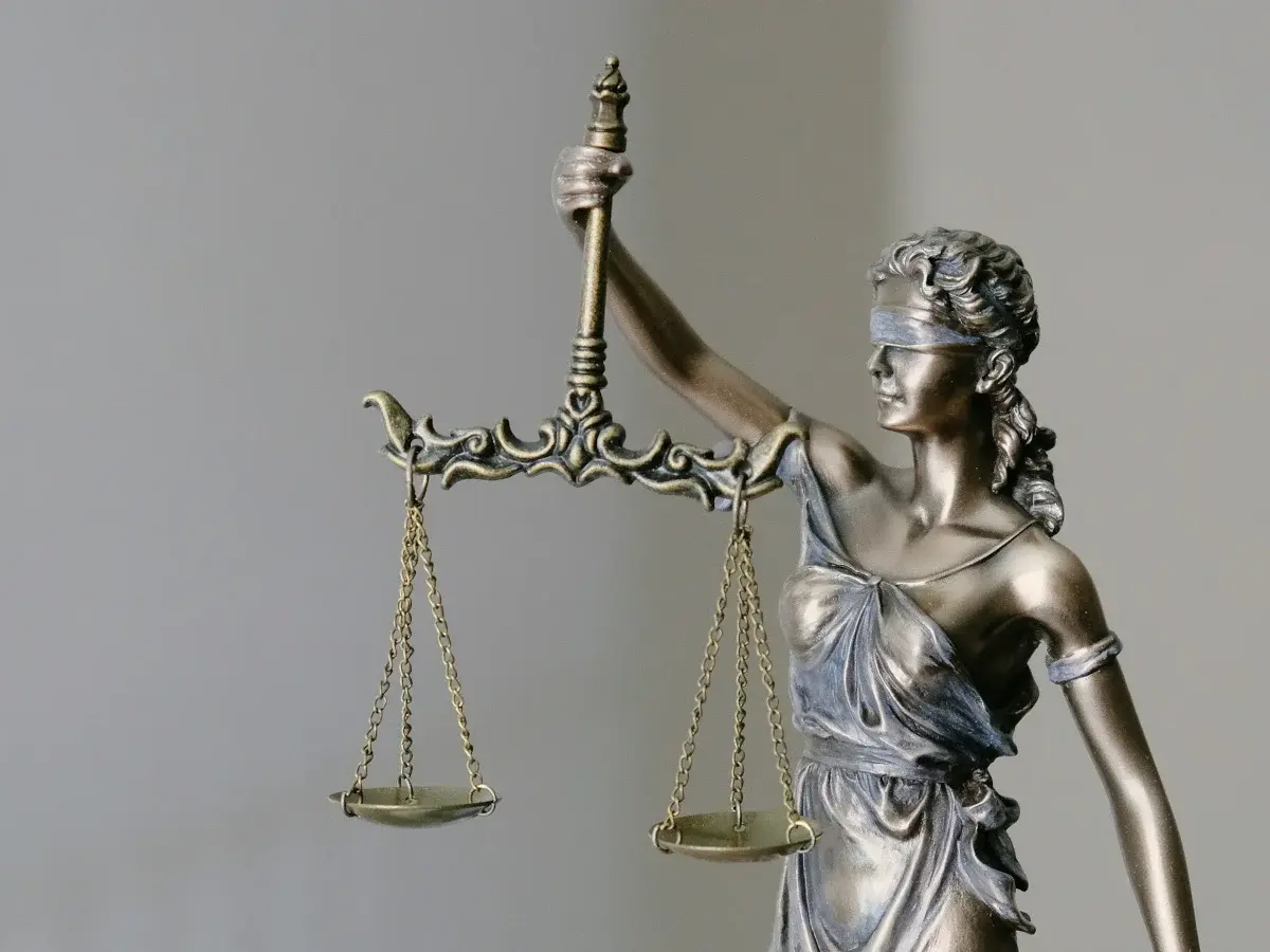 Lady Justice statue holding scales and a sword