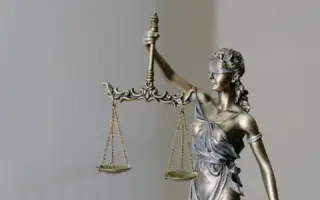 Lady Justice statue holding scales and a sword