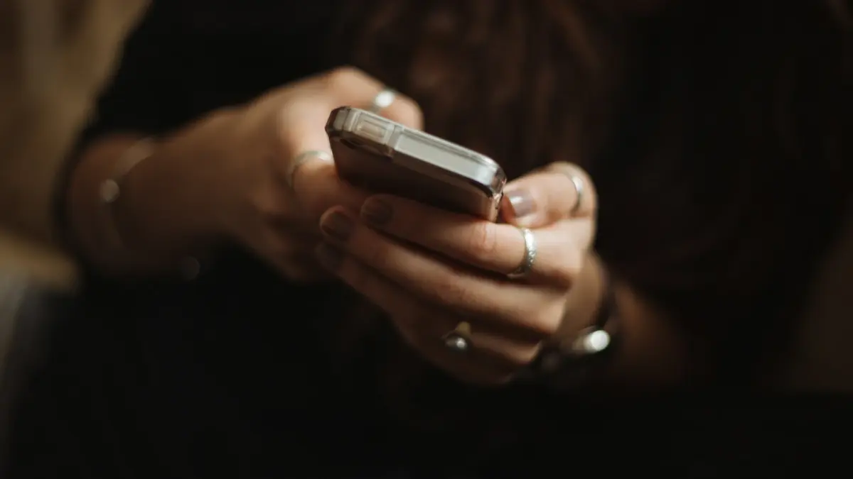 Close-up of hands holding a smartphone