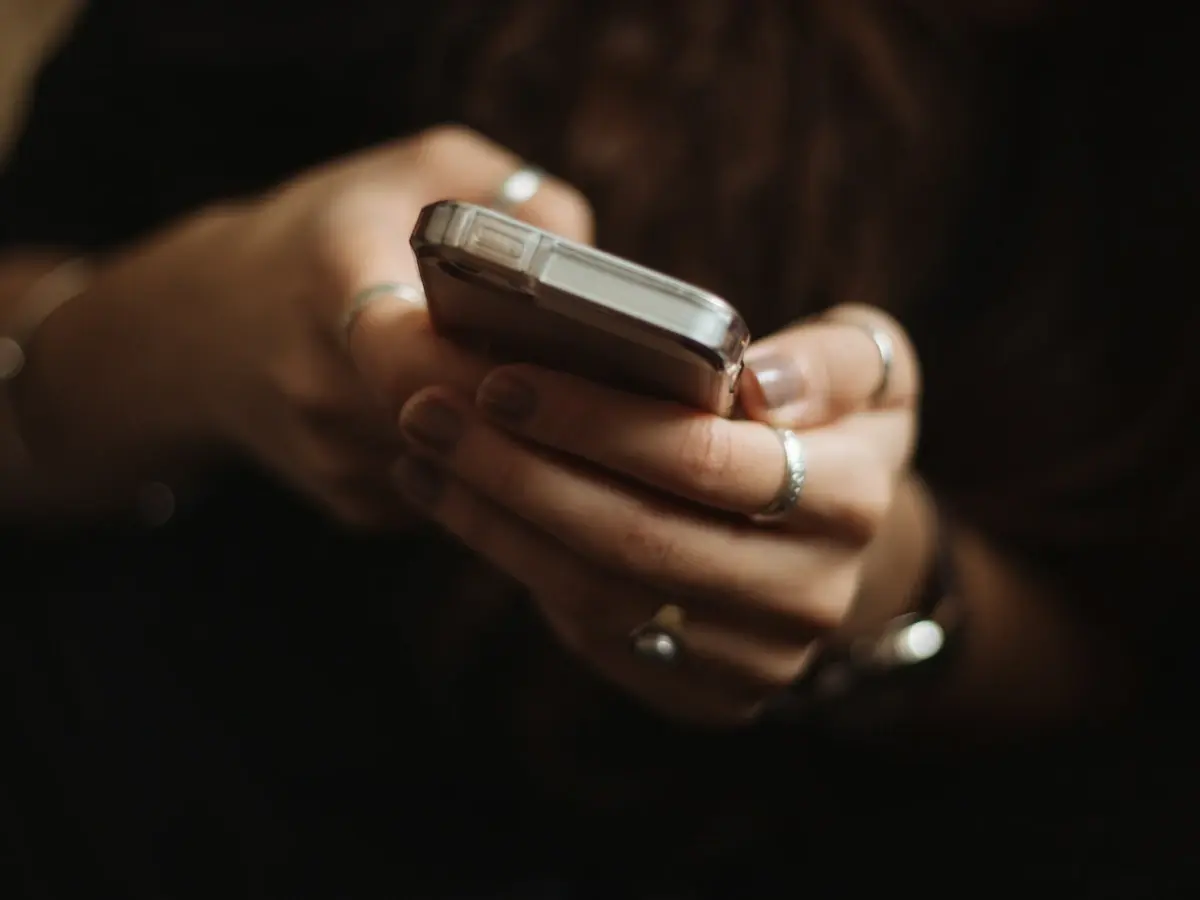 Close-up of hands holding a smartphone