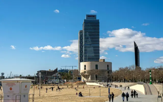 Barcelona's Port Olímpic seafront with the Hotel Arts tower