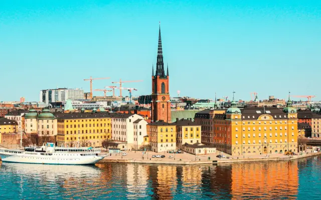Stockholm waterfront and Riddarholmen church in daylight